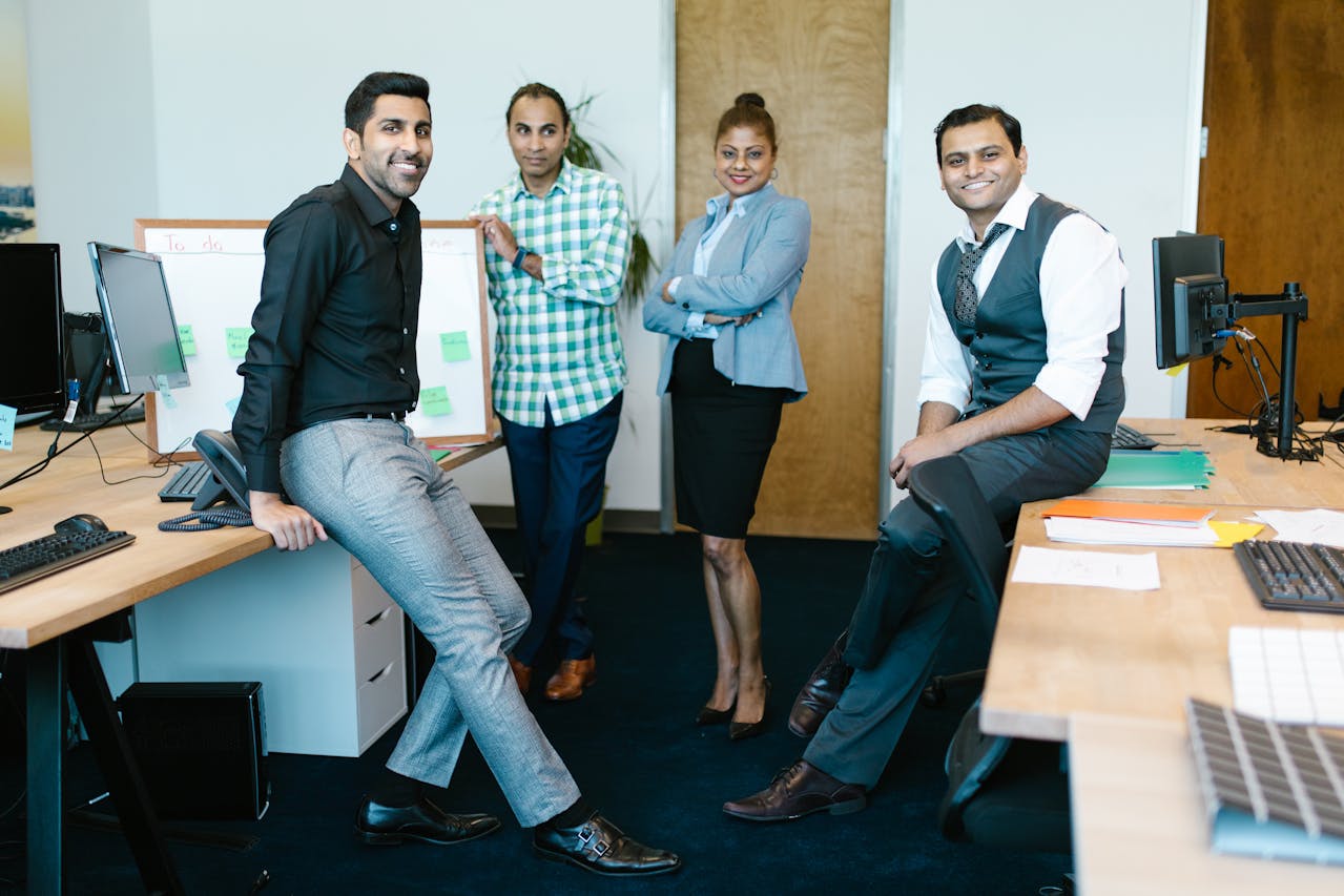 Indian professionals collaborating in a modern office
