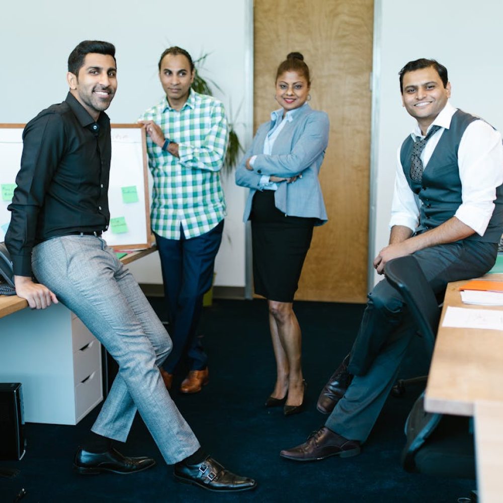 Indian professionals collaborating in a modern office